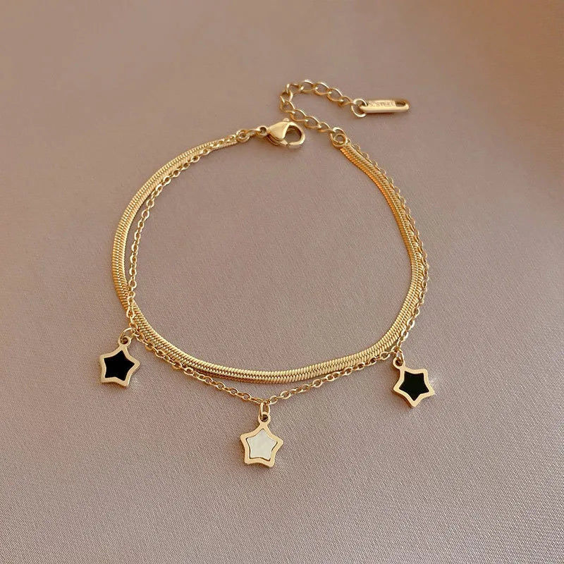 Conjunto Estelar Dourado Pulseira Aço Inoxidável 316L com Pingente de Estrela